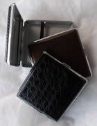 Chrome frame cigarette case : Assorted   black leatherette Open